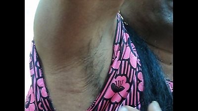 Indian female shaving her armpits hair by a sharp edged straight razor sleek and tidy ..AVI