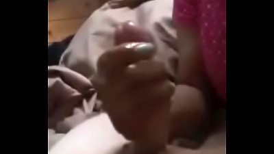 mom makes a handjob to her son before going to sleep
