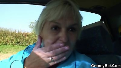 He smashing very older blond grandma roadside