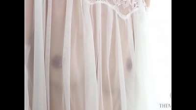 seduces in nipple-skimming insatiable clothing