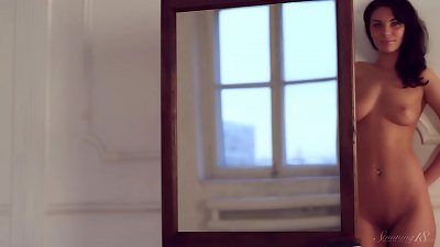 Dark Haired teen rubs Herself In Front Of The Mirror